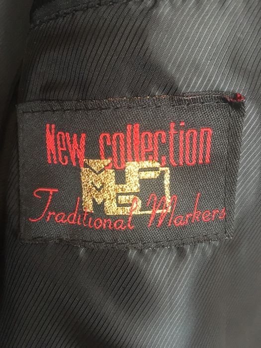 Костюм размер 50-52 состояние нового