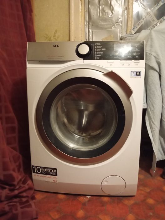 Продам стиральную машину премиум класса AEG L7FEE48S на 8 кг