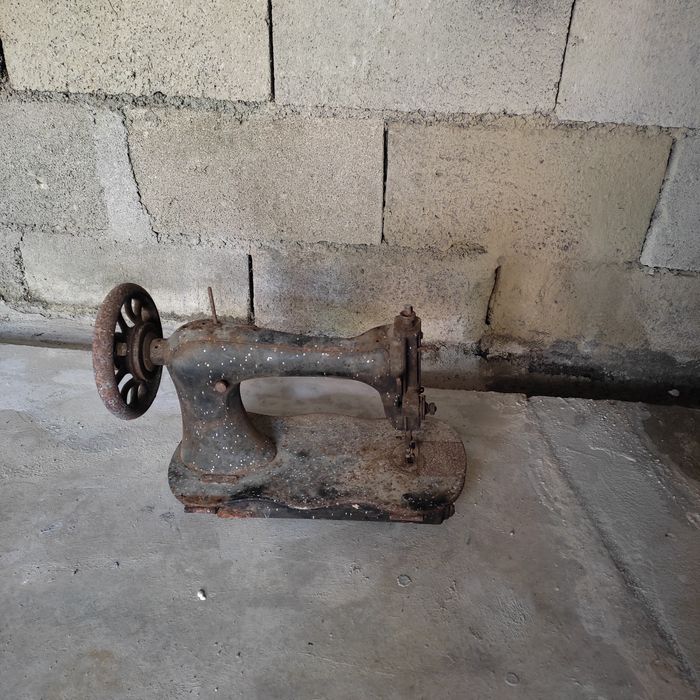 Cabeça de máquina de costura antiga