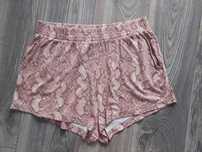H&M pudrowe wężowe szorty M/L