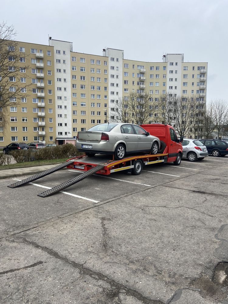 Pomoc drogowa/wynajem/ transport pojazdów/holowanie 24h auto zastępcze