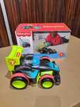 Wyścigówka Fisher Price.