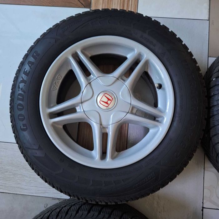 Колеса в зборі диски 114.3х5 резина зима 205х65х15р Goodyear