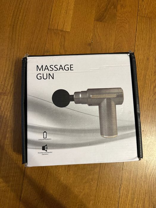 Перкусійний масажер (пістолет)