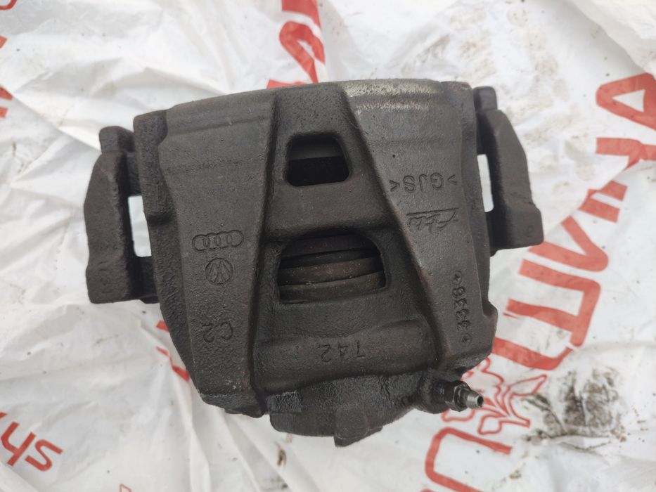 Суппорт гальмівний правий Volkswagen Passat B7 USA 2014р.