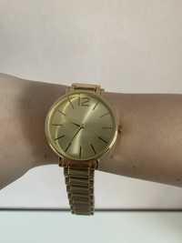 Жіночий годинник від бренду Sinsay в золоті