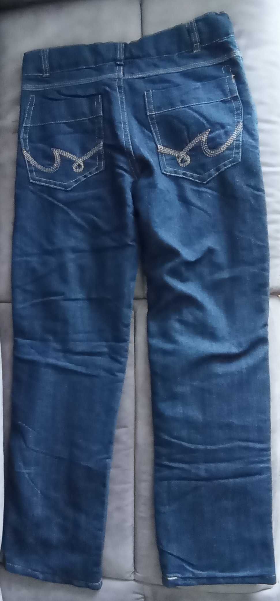 Sprzedam nowe spodnie jeans ocieplane dla dziewczynki rozmiar 158