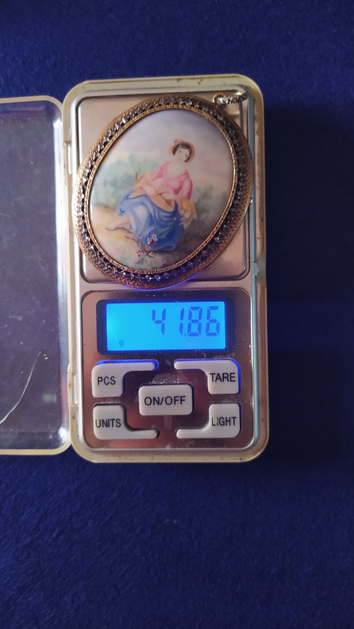 Pendente de ouro com prata e diamantes