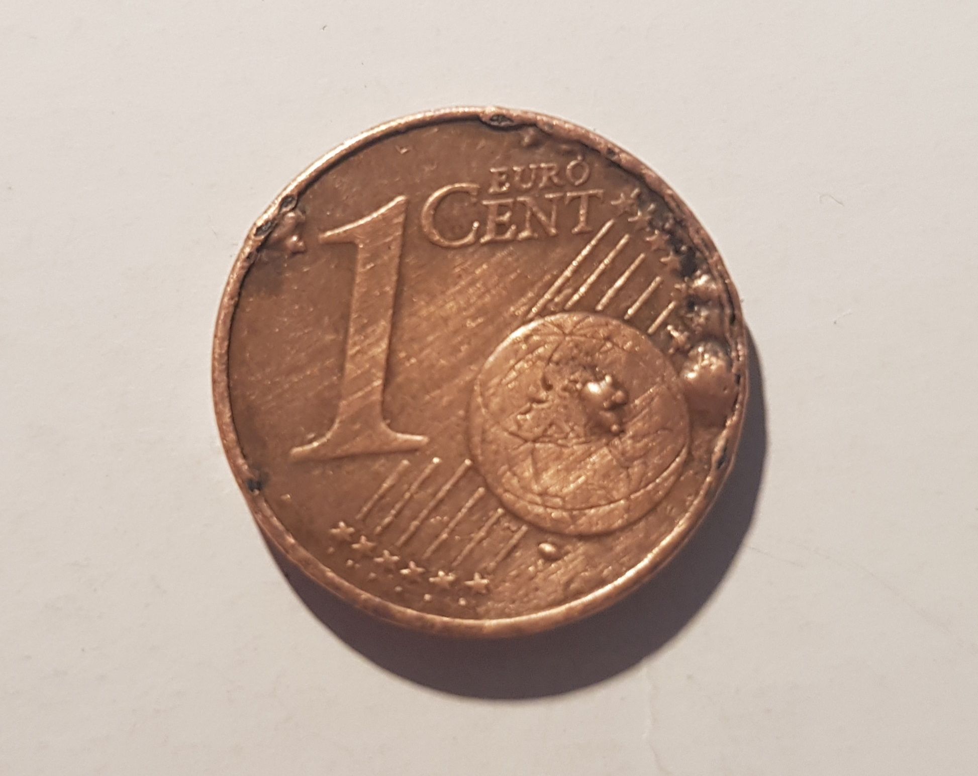 Vendo 2 moedas de 1 cêntimo com defeito