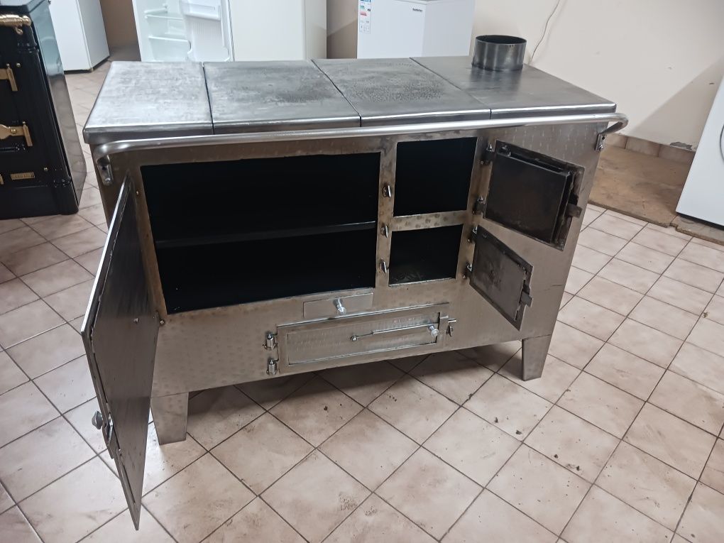 Vendo fogao em ferro inox com serpentina para aquecimento central em ó