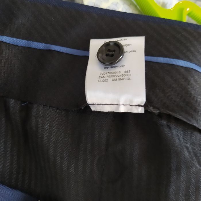 Nowe wizytowe męskie spodnie D+LJ eleganckie W32 wełna granat tanio