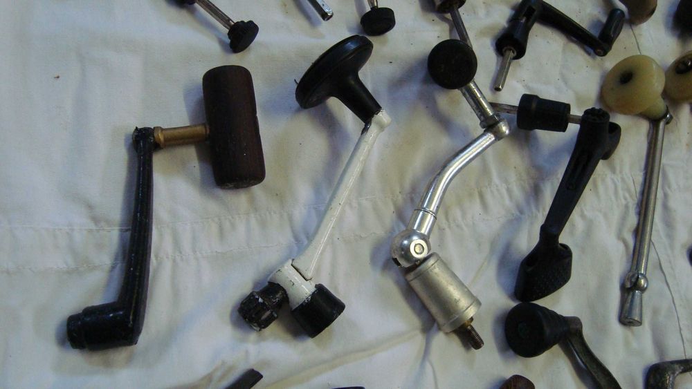 Material   para  pesca,  carretes  usados