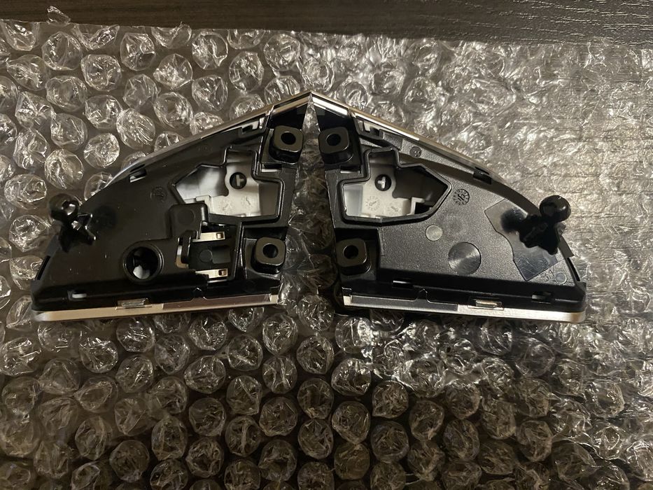 Кнопки до керма на Ауді