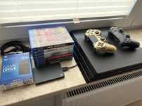 PS4 PRO z dyskiem seagate 2TB + 7 gier