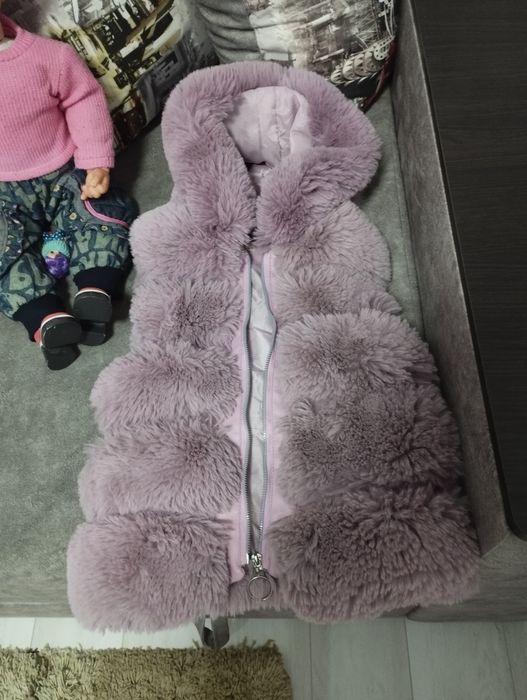 Продам детскую желетку состояние новой