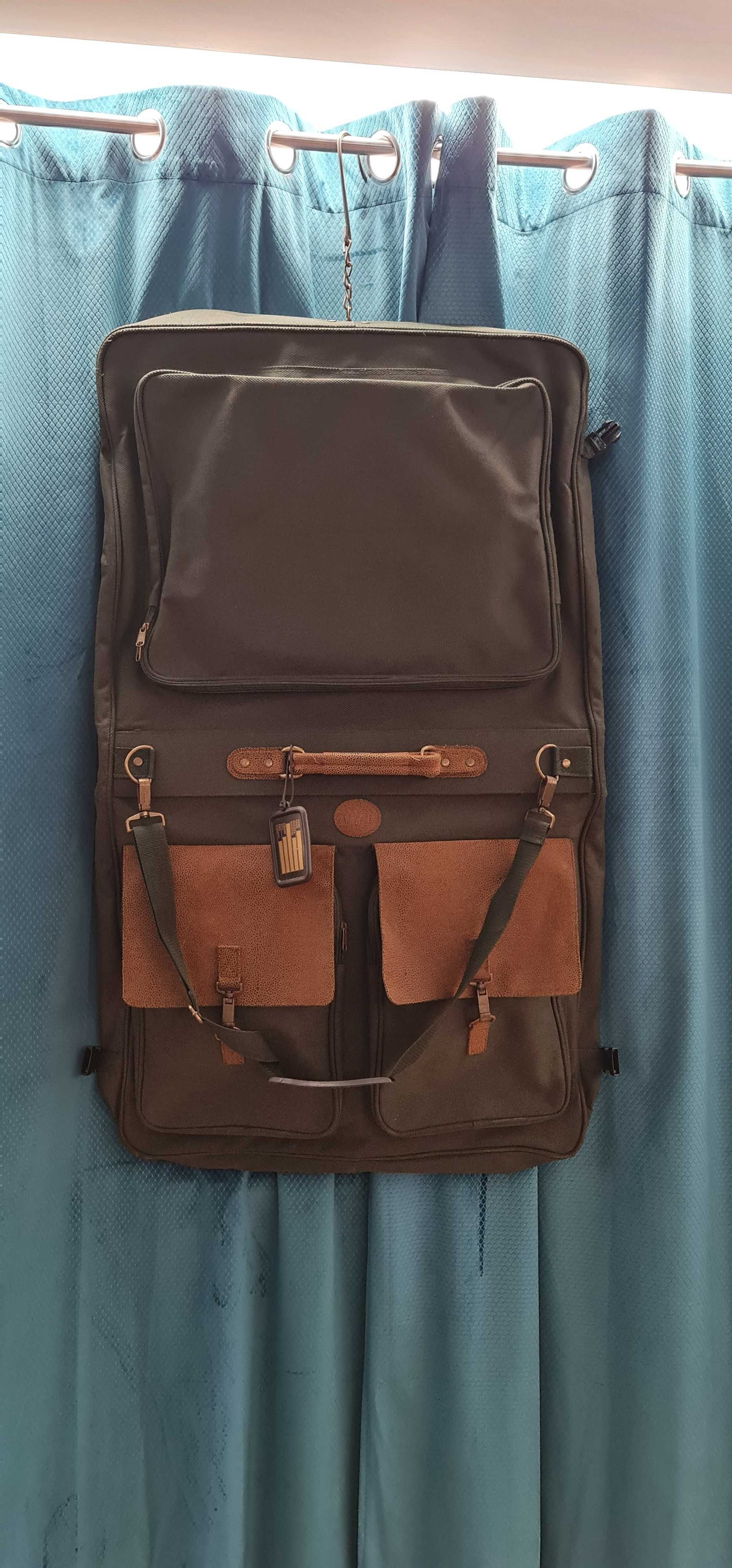 Mala viagem porta fatos. Ofereço mochila