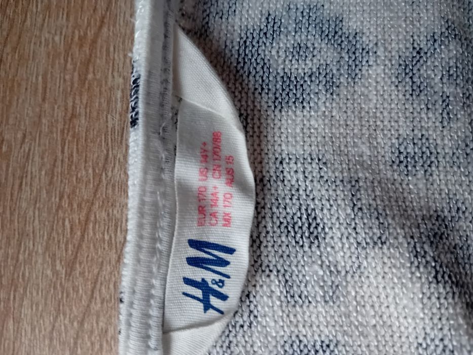 Kardigan H&M 170 narzutka asymetryczna biała we wzroki