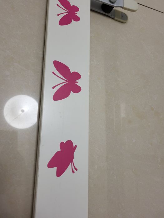 Barierka do łóżeczka