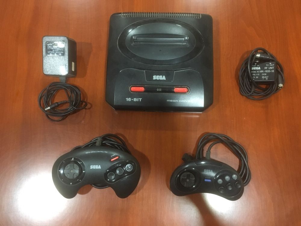 Nintendo + Comandos + Pistolas/Sega Mega Drive + Comandos + Jogos