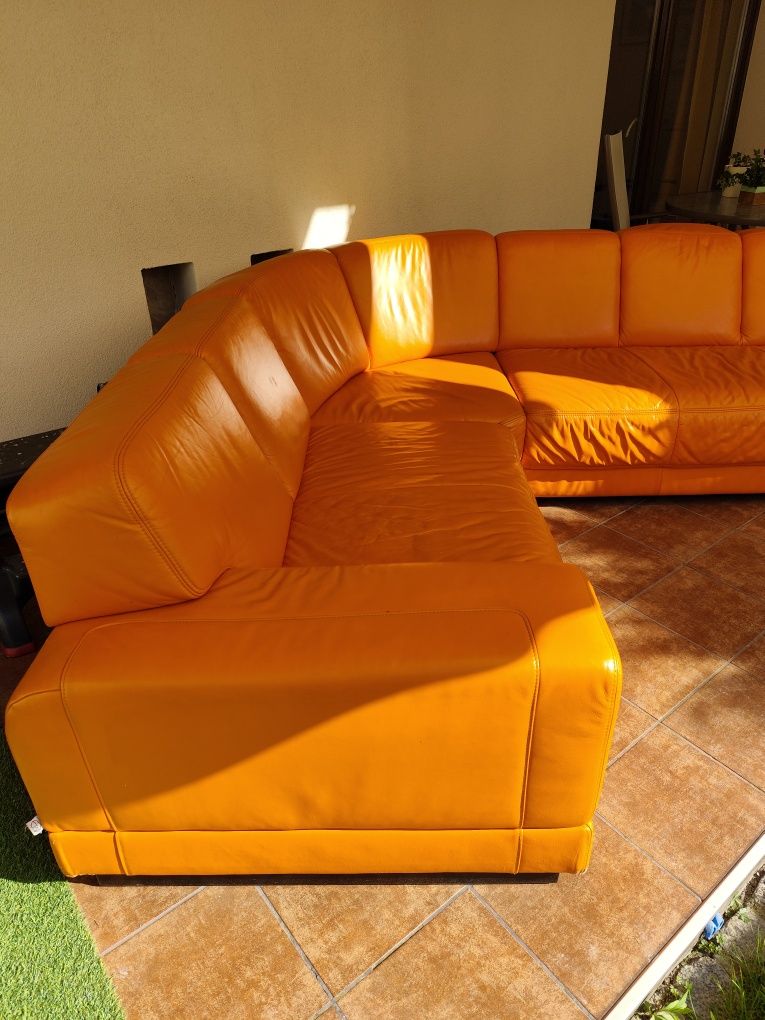 Piękna , pomarańczowa ,skórzana kanapa narożna