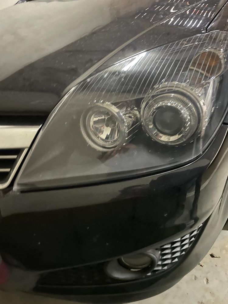 Farol esquerdo para Opel Astra, modelo angel eyes com fundo preto