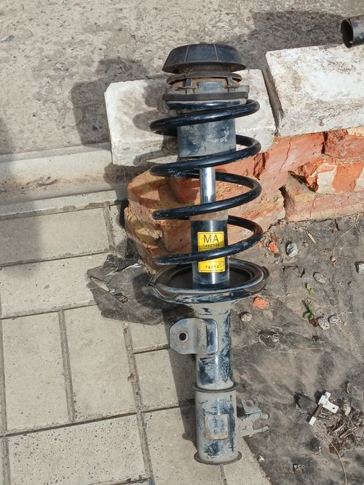 Передня стійка [амортізатор] шевроле лачети.