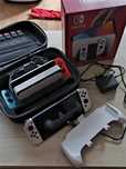 Nintendo Switch Oled + kufer + grip + 2 zapasowe pady