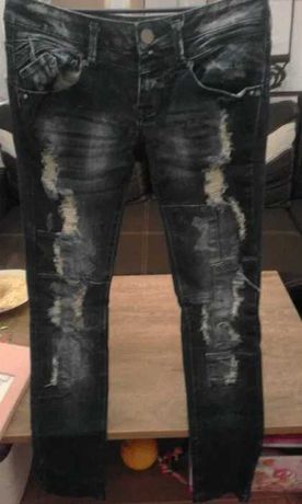 Spodnie jeansy dziury stan idealny rozm M L