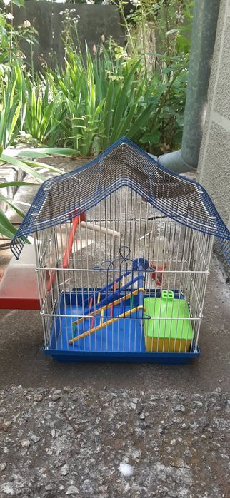 Клітка для папуги