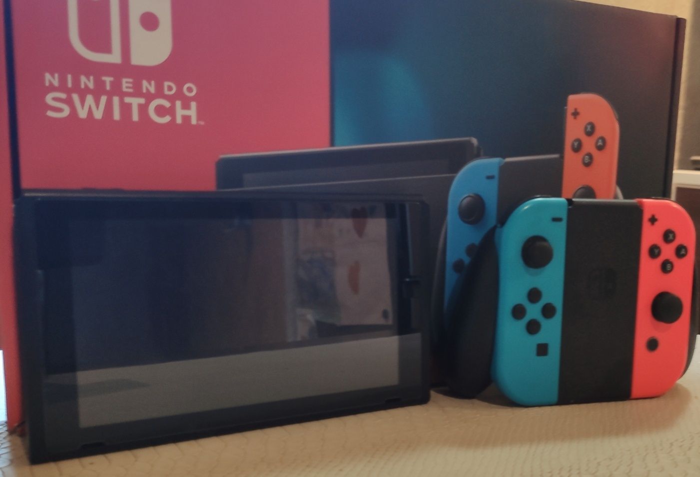 Nintendo Switch V2 + 5 gier + Pro Controller + torba BigBen – komplet!