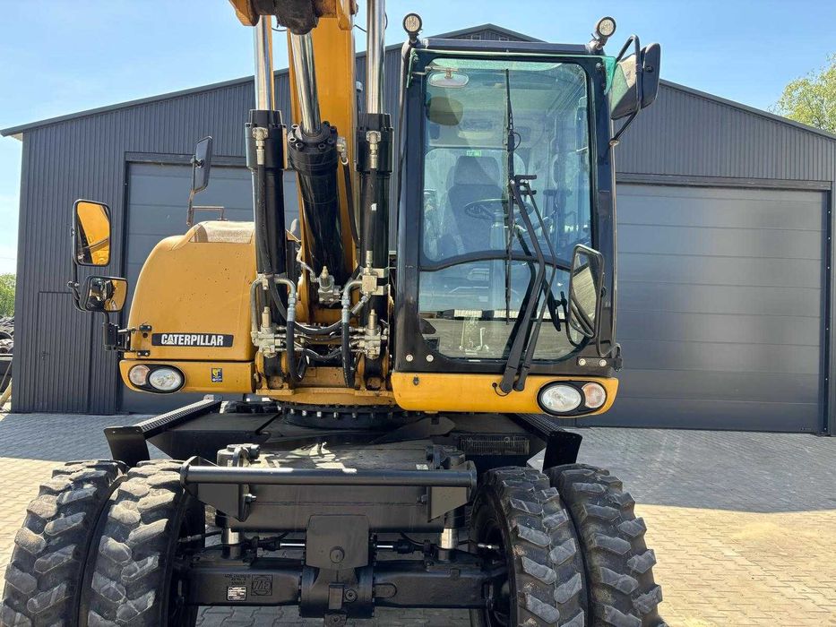 Wypożyczalnia, wynajmę- Koparka kołowa obrotowa CAT M318D