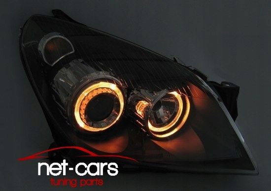 Reflektory lampy przednie przód OPEL ASTRA H Angel Eyes wzór Xenon