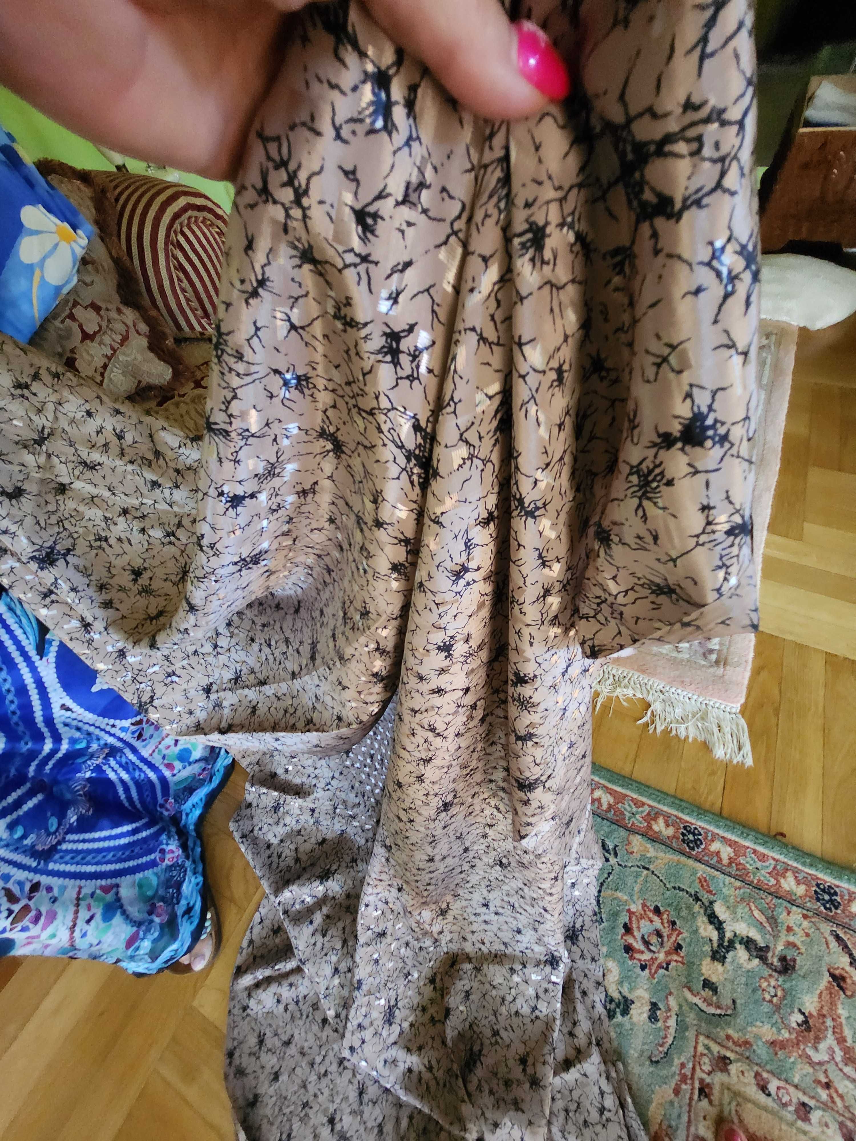 Kupon leistego brązowego materiału szer 1.10m dł 3.10 m