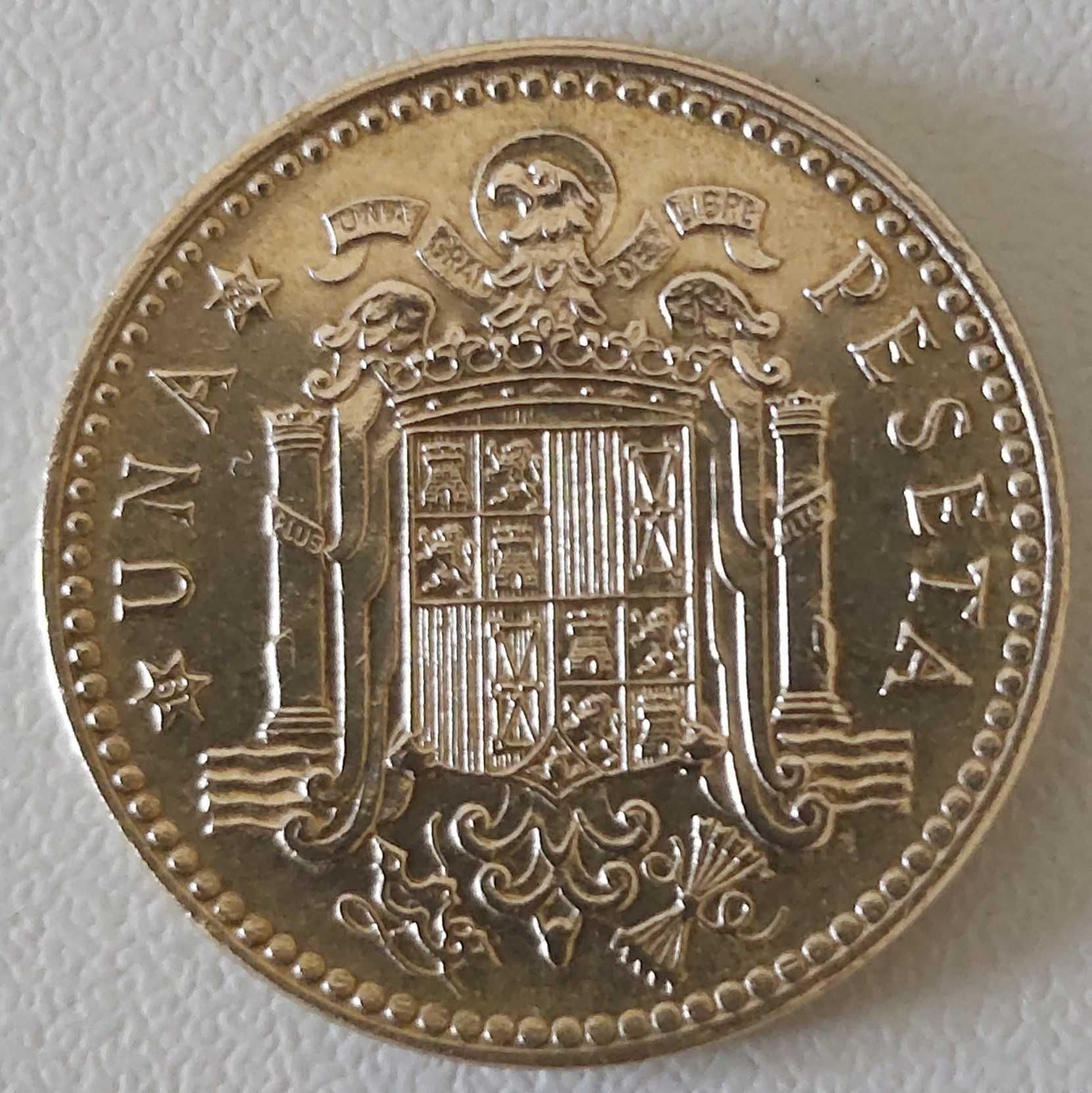 Una Peseta de 1975 com *80* na estrela