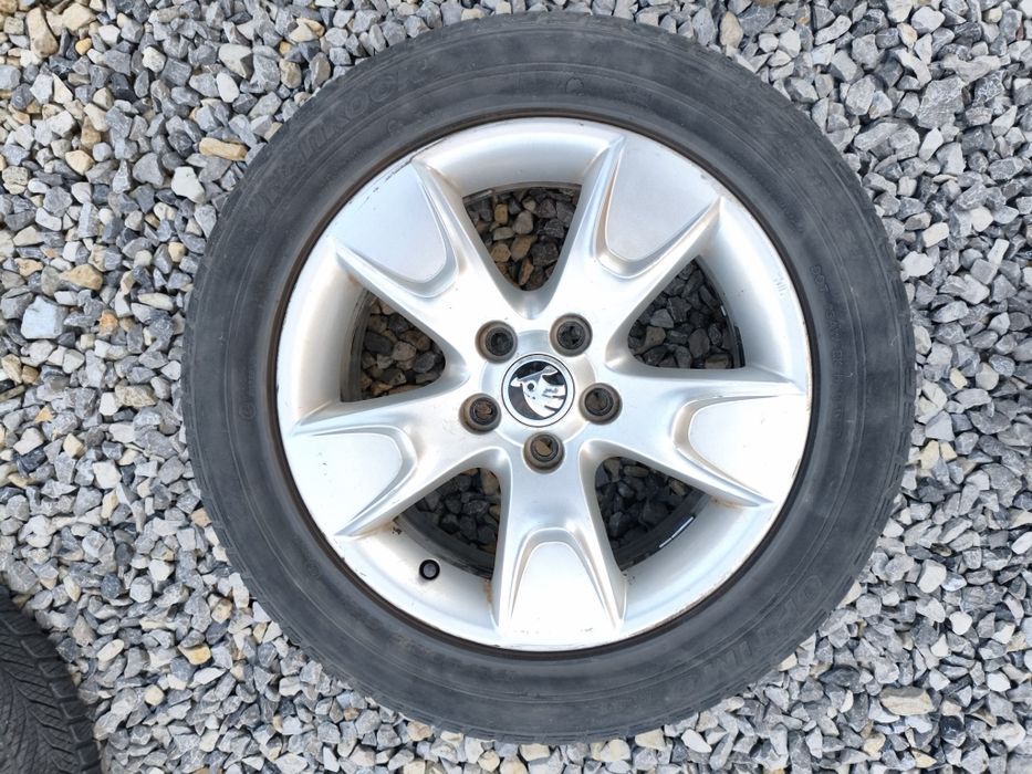 Koła SKODA felgi aluminiowe R15 2 szt opony letnie 5x100