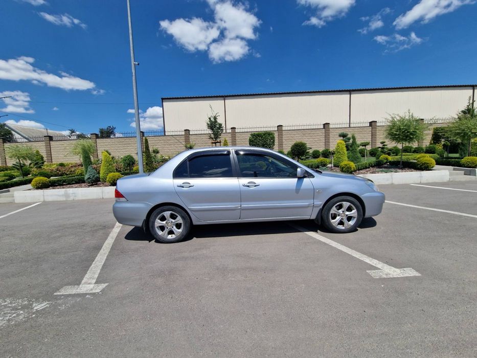Mitsubishi Lancer 9 бензин 1.6