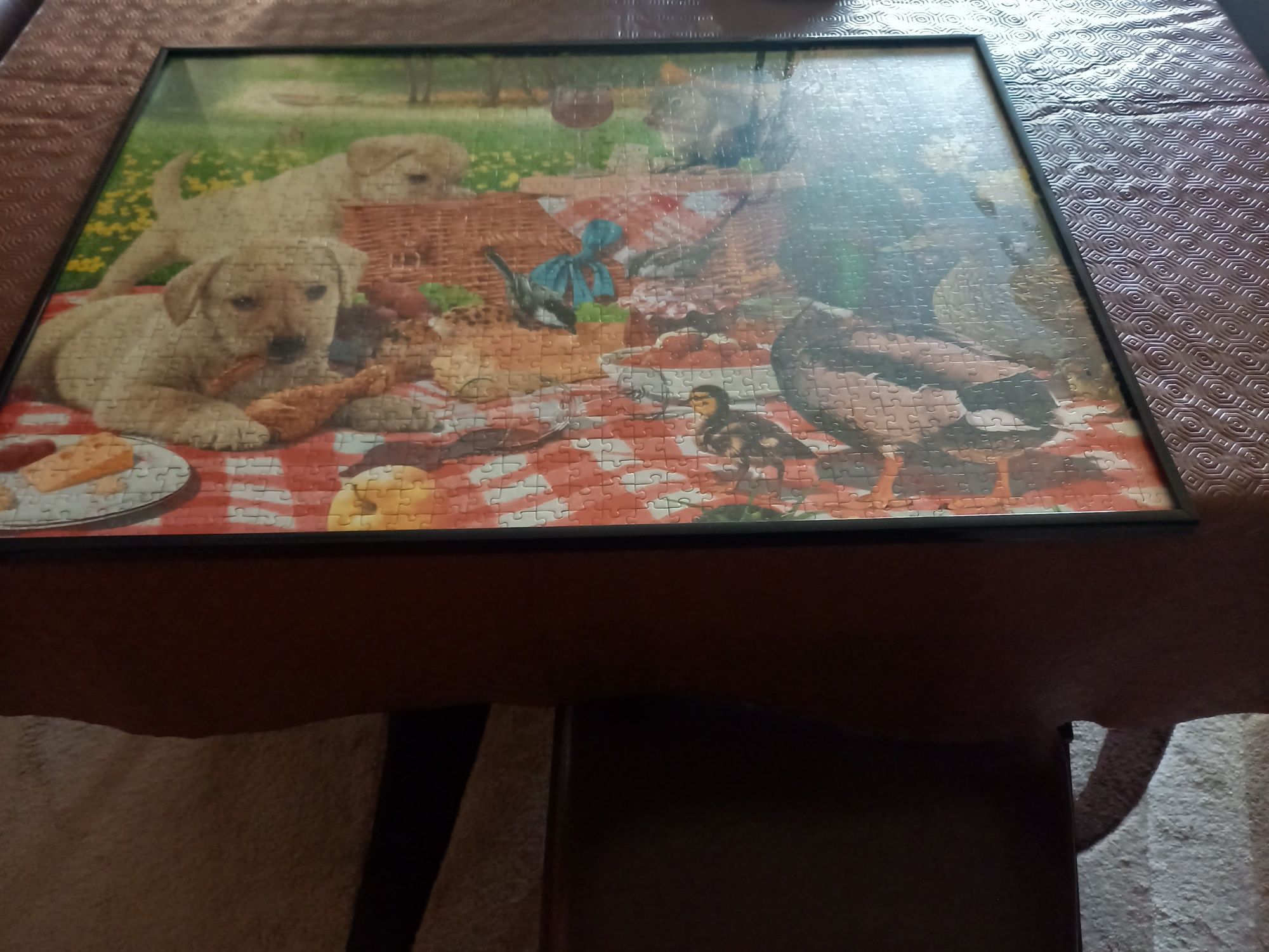 Moldura com puzzle de 1000 peças.