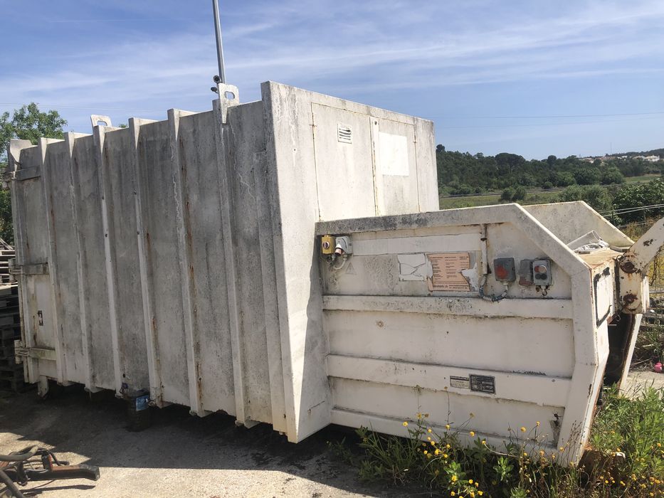 Contentor compactador