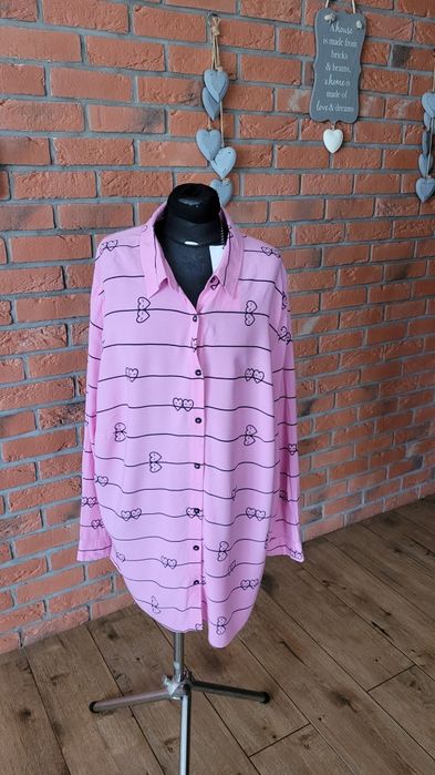 Koszula  model o luźnym oversize kroju długi rękawy duży roz