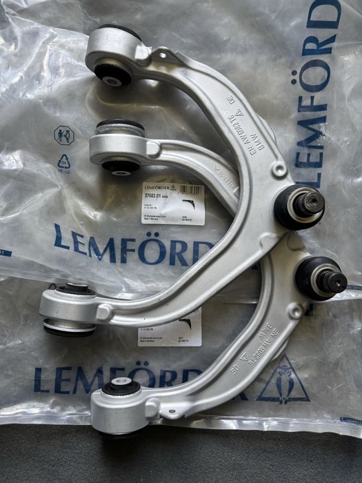 Важелі підвіски передні верхні BMW X5