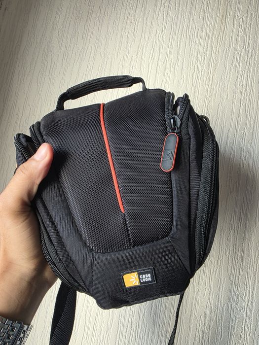 Canon EOS RP [NOVA] com uma mala, lente de 50 mm e carregador