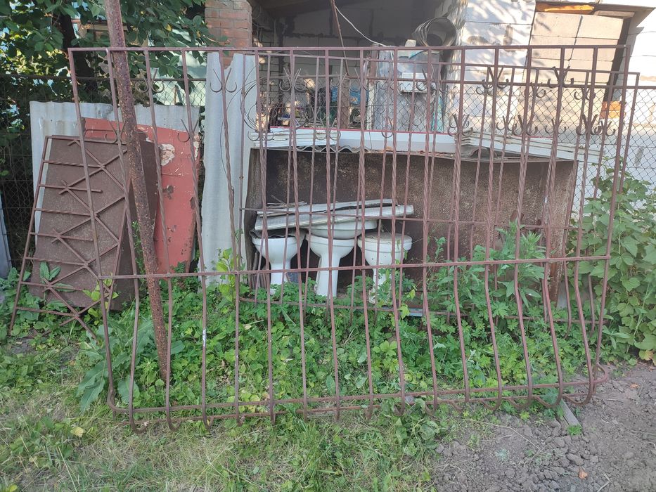 Решотки  (грати) кованые  на  окона