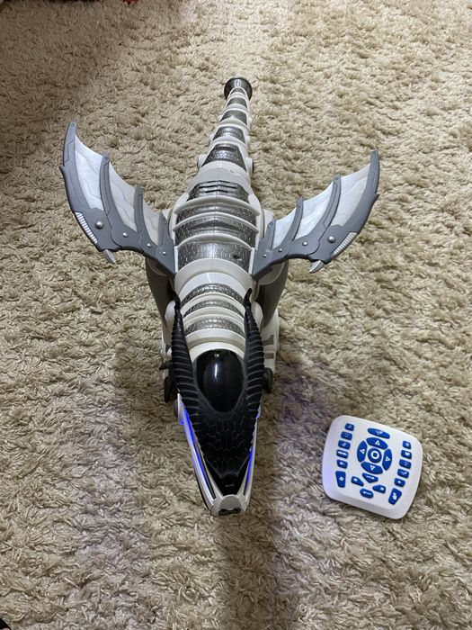 Робот динозавр з пультом