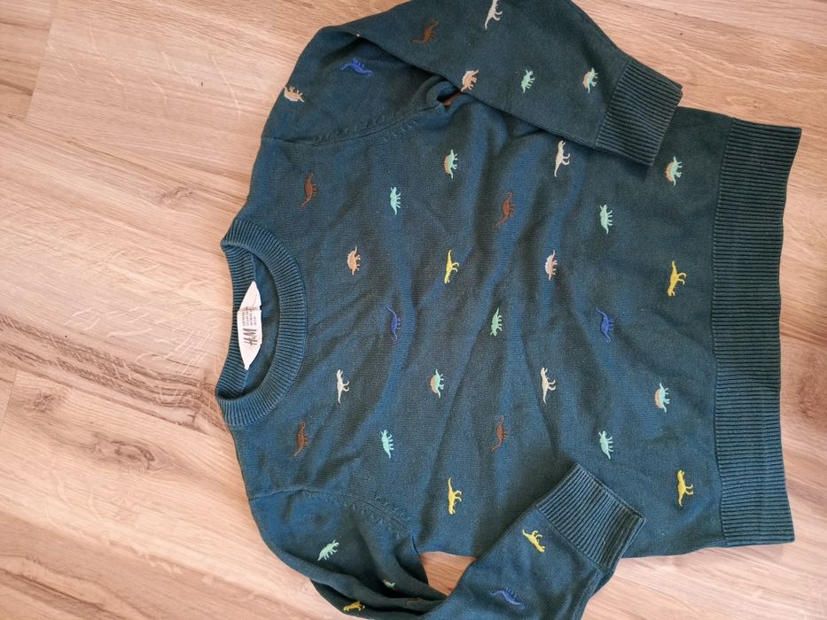 Ciemno zielony sweterek chłopięcy dinozaury H&M 98/104