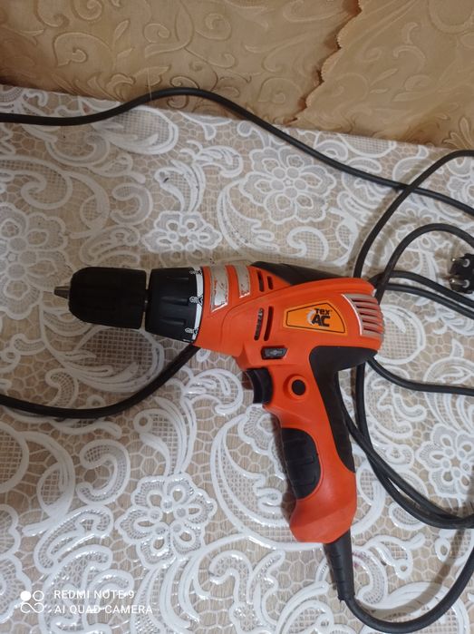Дрель електрична