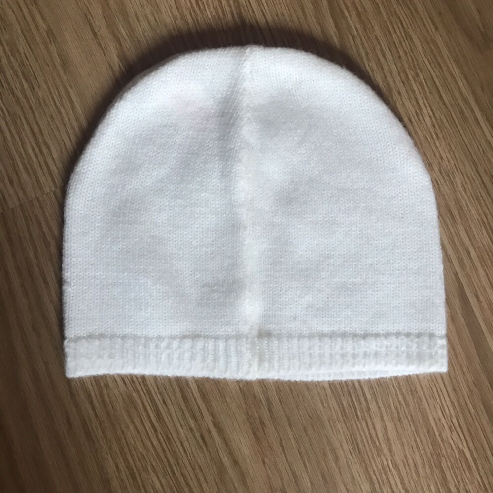 Casaco e gorro em lã