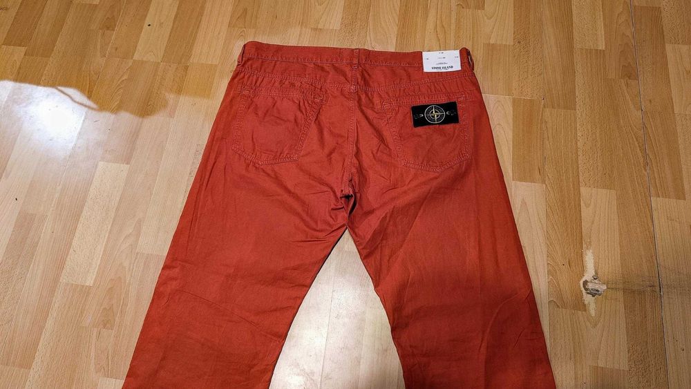 Męskie spodnie jeansowe STONE ISLAND r.XL pomarańczowe st.bardzo dobry