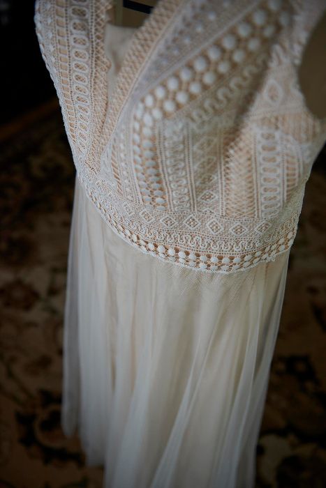 MAGGIO RAMATTI. Piękna suknia ślubna z oryginalną koronką.