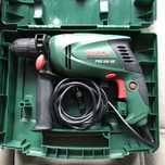 Wiertarko-wkrętarka udarowa Bosch 230 V 600 W - stan bardzo dobry