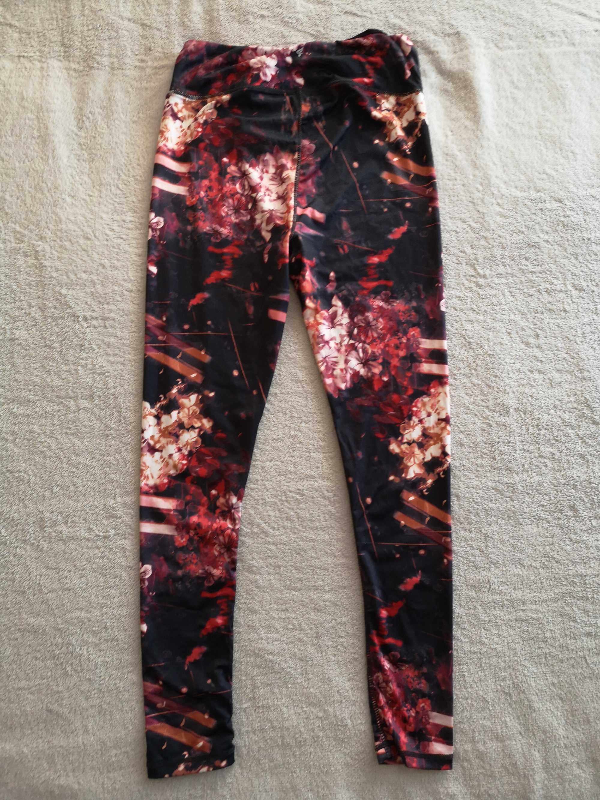 Czarne kolorowe spodnie legginsy sportowe w kwiatki Workout ok 36 - 38